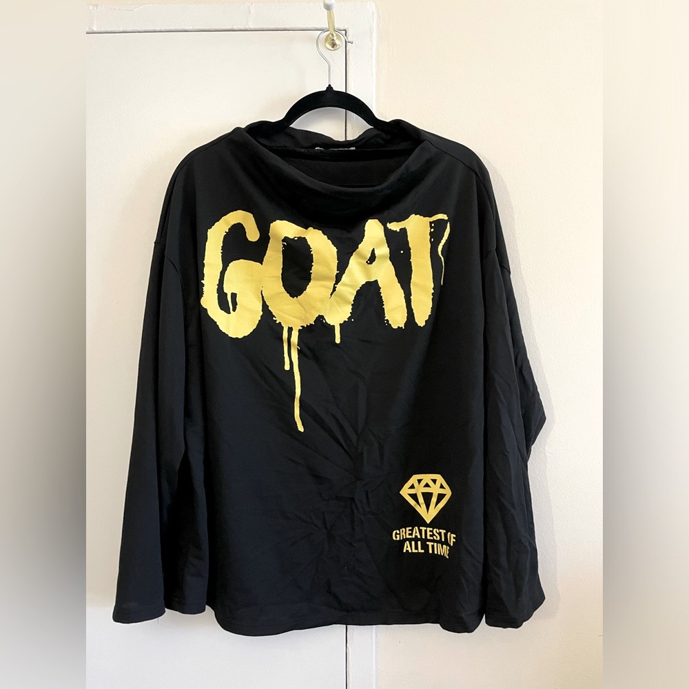 GOAT shirt.